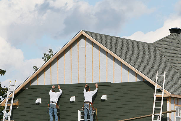 Professional Siding Contractor technician working in Ronda, NC